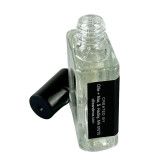 Ollie + Max Chocolat Noir Vegan Perfume Oil - 1/2 oz, glass perfume bottle with black cap and black label.