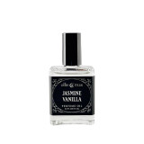 Ollie + Max Jasmine Vanilla Perfume Oil - 1/2 oz, clear glass bottle with black and white label and black cap, featuring elegant white script detailing, ideal for luxurious fragrance collection.