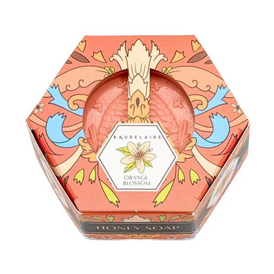 Baudelaire Orange Blossom Honey Soap - 3.5 oz, decorative soap in pink floral and dragonfly packaging with a hexagonal label featuring a white orange blossom flower.