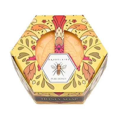 Baudelaire Pure Honey Soap - 3.5 oz, hexagonal soap in decorative honeybee themed box with floral design and soft pastel colors.