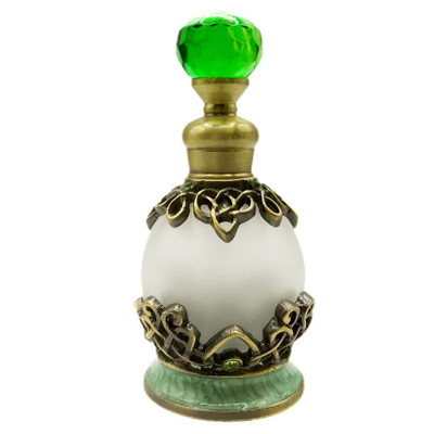 Uncommon Scents #7 Green Perfume Bottle, 15ml Round with ornate gold and green accents and a faceted green cap.