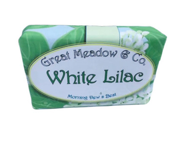 Great Meadow White Lilac Luxurious Bath & Body Bar - 5 oz., soap bar wrapped in green and white packaging with a floral design.