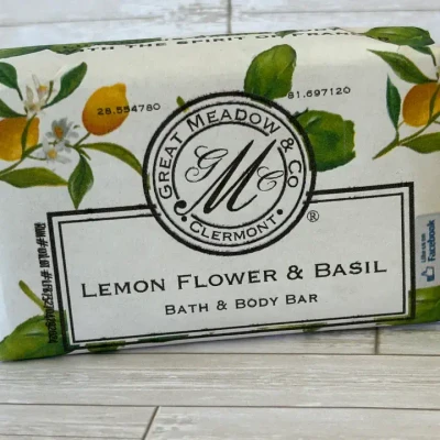 Great Meadow Lemon Flower & Basil Luxurious Bath & Body Bar - 5 oz., soap bar with floral and citrus illustrations on the packaging.