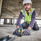 Dewalt DW088CG Green Self Levelling Cross Line Laser in use on site showing green line