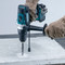 Makita DLX2145TJ 18V Combi Drill & Impact Driver Twin Pack (2 x 5.0Ah Batteries) combi in action drilling concrete