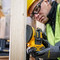 Dewalt DCW210N 18V XR 5 inch/125mm Brushless Random Orbital Sander (Body Only) in use sanding post