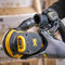 Dewalt DCW210N 18V XR 5 inch/125mm Brushless Random Orbital Sander (Body Only) in use attaching dust extractor