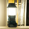 Makita DMR056O 18V/14.4V LXT AM/FM Bluetooth DAB/DAB+ Radio Lantern in Olive (Body Only) in use lighting dark space 