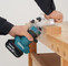 Makita 18V LXT brushless router in action, demonstrating its smooth start function.