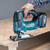 Makita DLX2202TJ1 50th Anniversary 18V LXT Brushless Combo Kit (2 x 5.0Ah Batteries) in MakPac Case jigsaw in use cutting laminated board