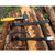 XTrade X0900006 Pry Bar Set sitting on logs