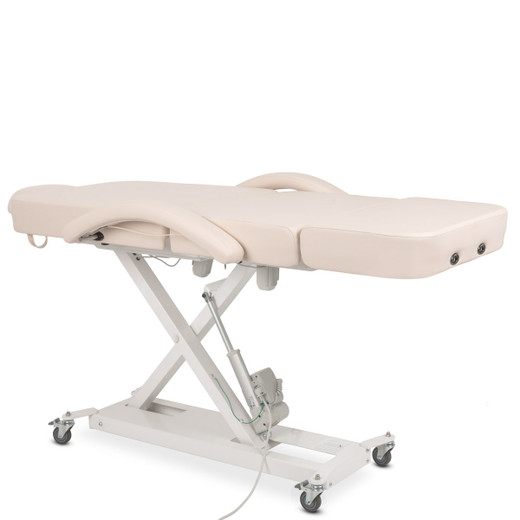Eden Electric Facial Bed in Beige shown from three-quarter view to the right shown flat fully lifted