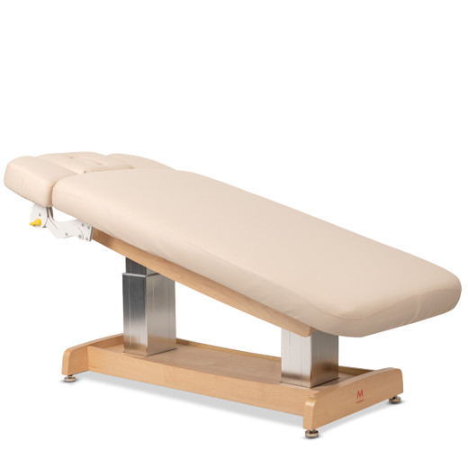 Zenith Flat Electric Spa Massage Table with Face Cradle and Armrest in Beige shown from three-quarter angle to the right tilted forward