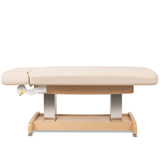 Zenith Flat Electric Spa Massage Table with Face Cradle and Armrest in Beige shown from the wide