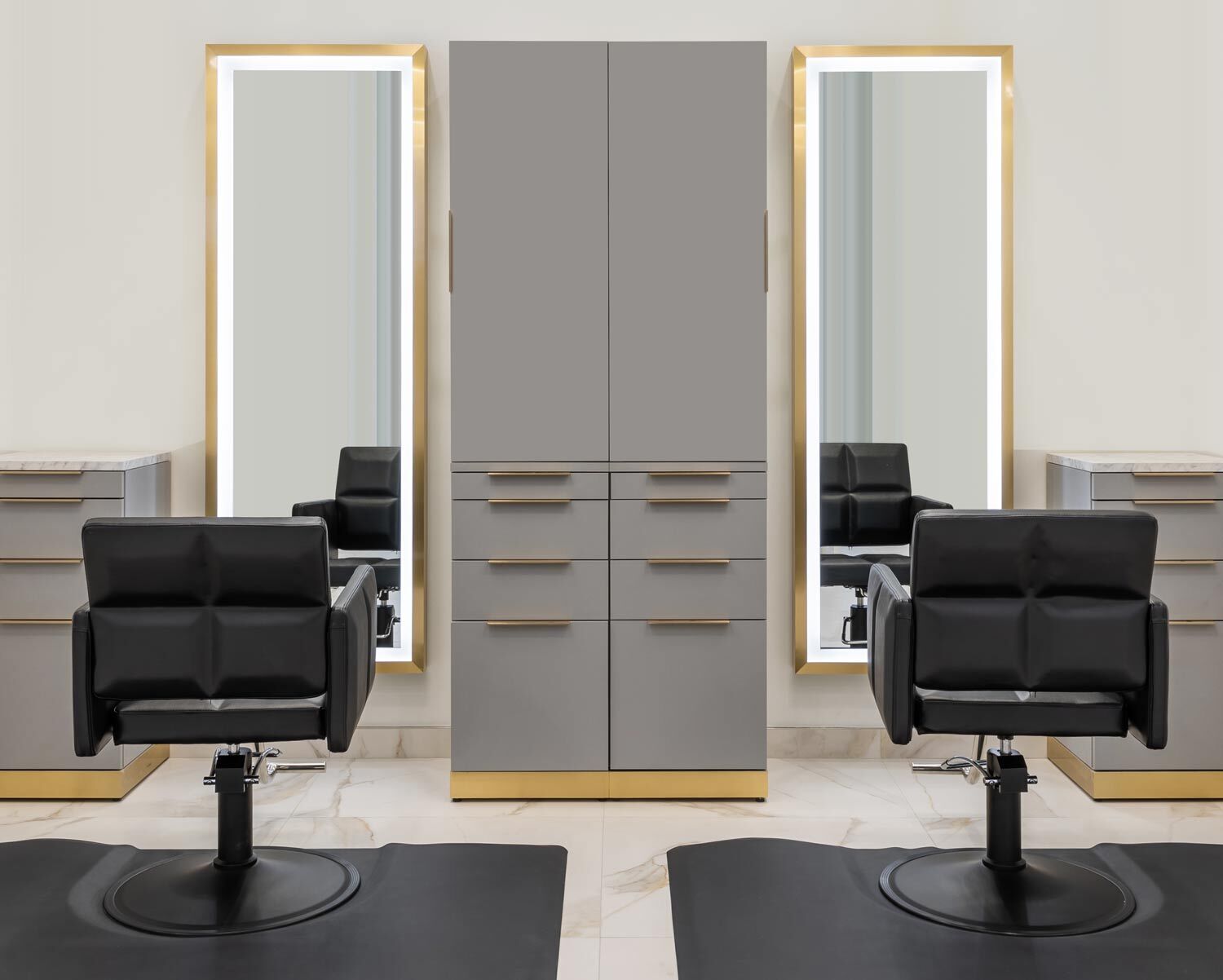 Salon Styling Chairs with Salon Styling Stations in lifestyle setting at Invisible Bead Extensions salon