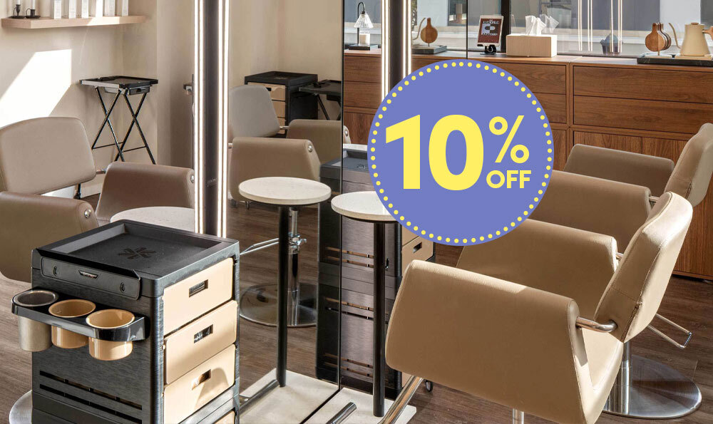 Black and beige mobile salon carts with color storage, appliance rings, and drawer storage next to LED salon mirrors and beige salon styling chairs in a salon