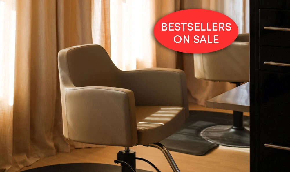 Cashmere venturi salon styling chair with black kamino styling station with gold hardware and full length shelf