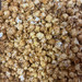 Close up Picture of Colette's Popcorn Crabby Caramel, old Bay Popcorn