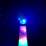 Detail: Dichroic cube shown on color changing wood stand