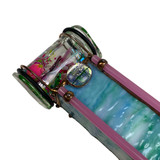 Detail: Pretty iridescent glass pebble and pink glass rod accents