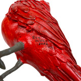 Detail: Artist signature under bird