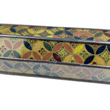 Detail: Gorgeous gilded pattern under glass