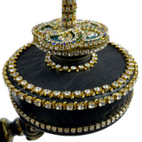 Detail: Turning, wind-up base of Parrot