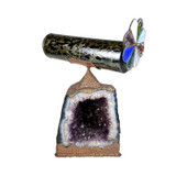 Front view, scope spins above geode