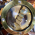 Detail: Peeking through side lens at gears