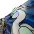 Detail: RAINBOW FLASH in the white glass!