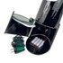 Detail: Compartment open showing batteries, wall plug, black & white background slot, and artist signature