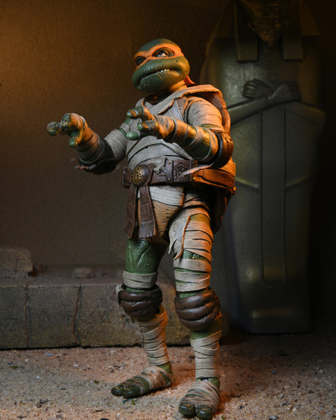 NECA Universal Monsters x Teenage Mutant Ninja Turtles Ultimate Michelangelo as The Mummy 7-Inch Scale Action Figure