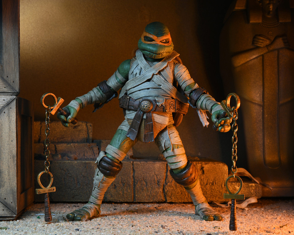 NECA Universal Monsters x Teenage Mutant Ninja Turtles Ultimate Michelangelo as The Mummy 7-Inch Scale Action Figure NECA Universal Monsters x Teenage Mutant Ninja Turtles Ultimate Michelangelo as The Mummy 7-Inch Scale Action Figure