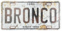 HangTime Ford Bronco Novelty Metal auto tag with Rust Background