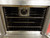 VULCAN GAS DOUBLE STACK CONVECTION OVEN WITH CASTERS NO WARRANTY MANUFACTURER