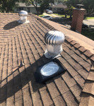 Solatube Low Profile Skylight Kit with 14-inch tube on a brown shingled roof.
