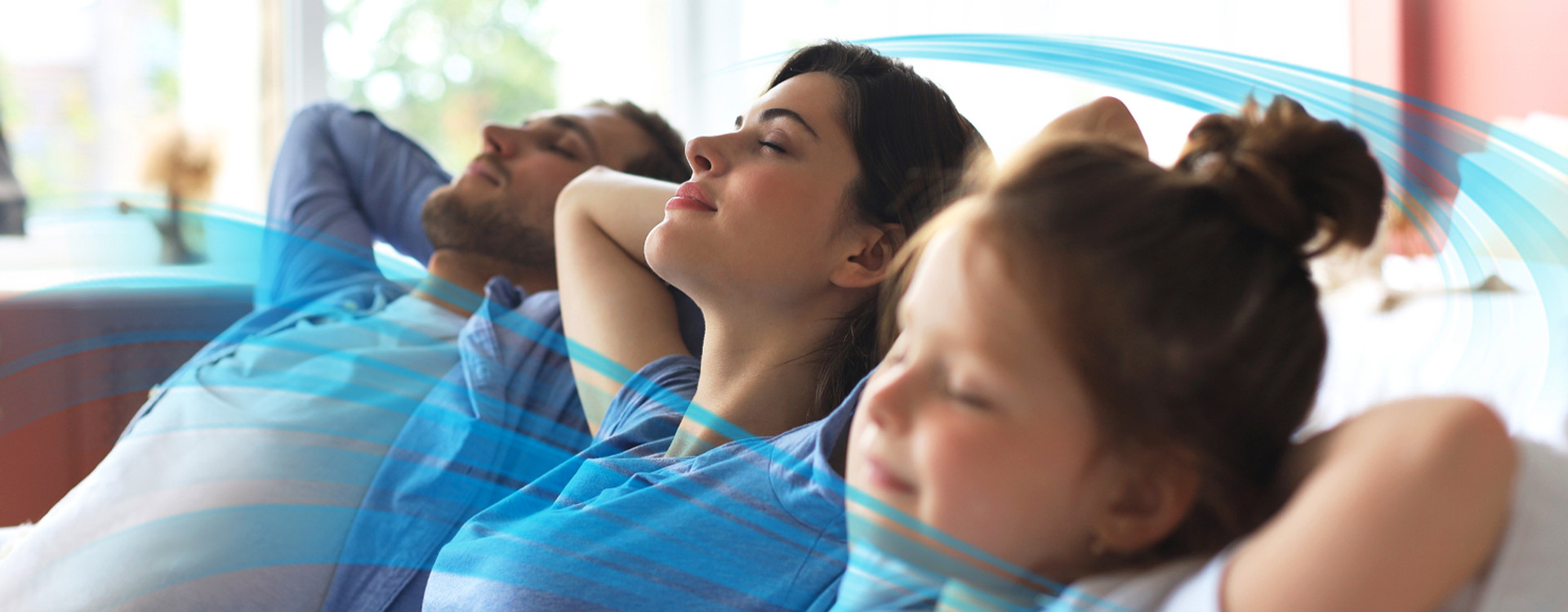 Roof with solar attic fan under blue sky