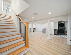 How can you add natural light to a basement or windowless room