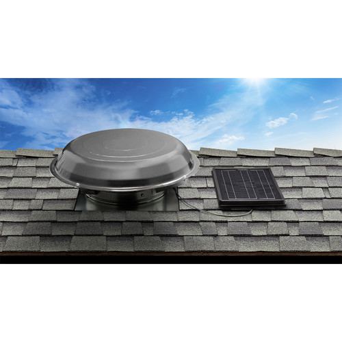 Solatube solar-powered attic fan with solar panel mounted on shingled roof. Solatube solar-powered attic fan with solar panel mounted on shingled roof.