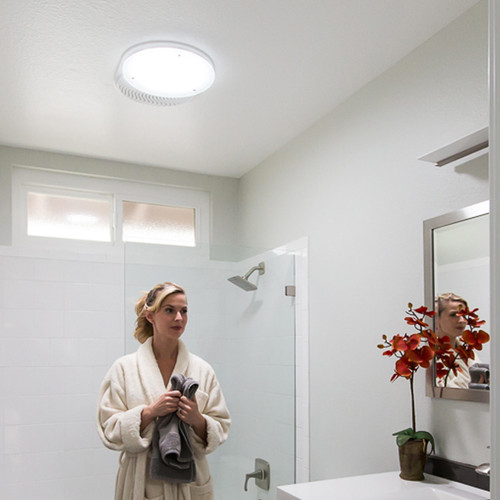 Solatube Ventilation Add-On Kit installed in a bright bathroom.
