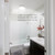 Solatube Light Add-On Kit installed in a bathroom, showing the diffuser with integrated lighting.