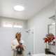Solatube Ventilation Add-On Kit installed in a bright bathroom.
