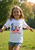 Give your child something patriotic they’ll actually want to wear every day — not just on holidays.  This soft, comfortable tee celebrates the country we love in a fun, everyday way. It helps kids feel proud of where they come from while reminding them (and everyone around them) that loving America is something to celebrate all year long.