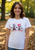 Raise a child who leads with kindness. This tee is a daily, wearable reminder that seeing the world with eyes full of love makes them (and everyone around them) happier and stronger.
