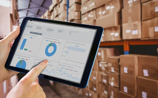 Hand interacting with data metric visualizations graph tablet application inside storage layout