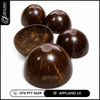 Polished coconut shells ready to make candles