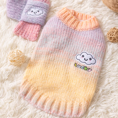 Knit dog sweater with ribbed neckline and hem, soft knitted texture, and a cute embroidered patch on the front.