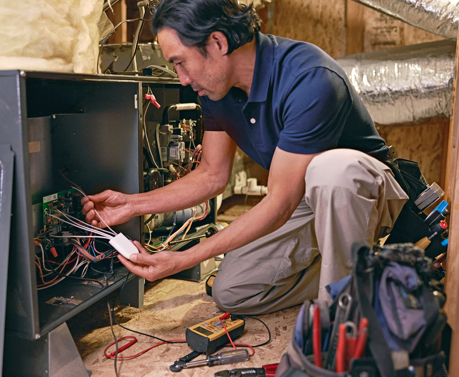 Man installing nest power connector