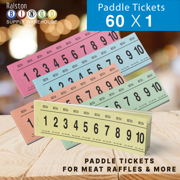 Photos of 60 - 1 paddle tickets from bingosupplywarehouse.com nicely displayed paddles in pink blue yellow orange and green with a soft lighted casino room in background