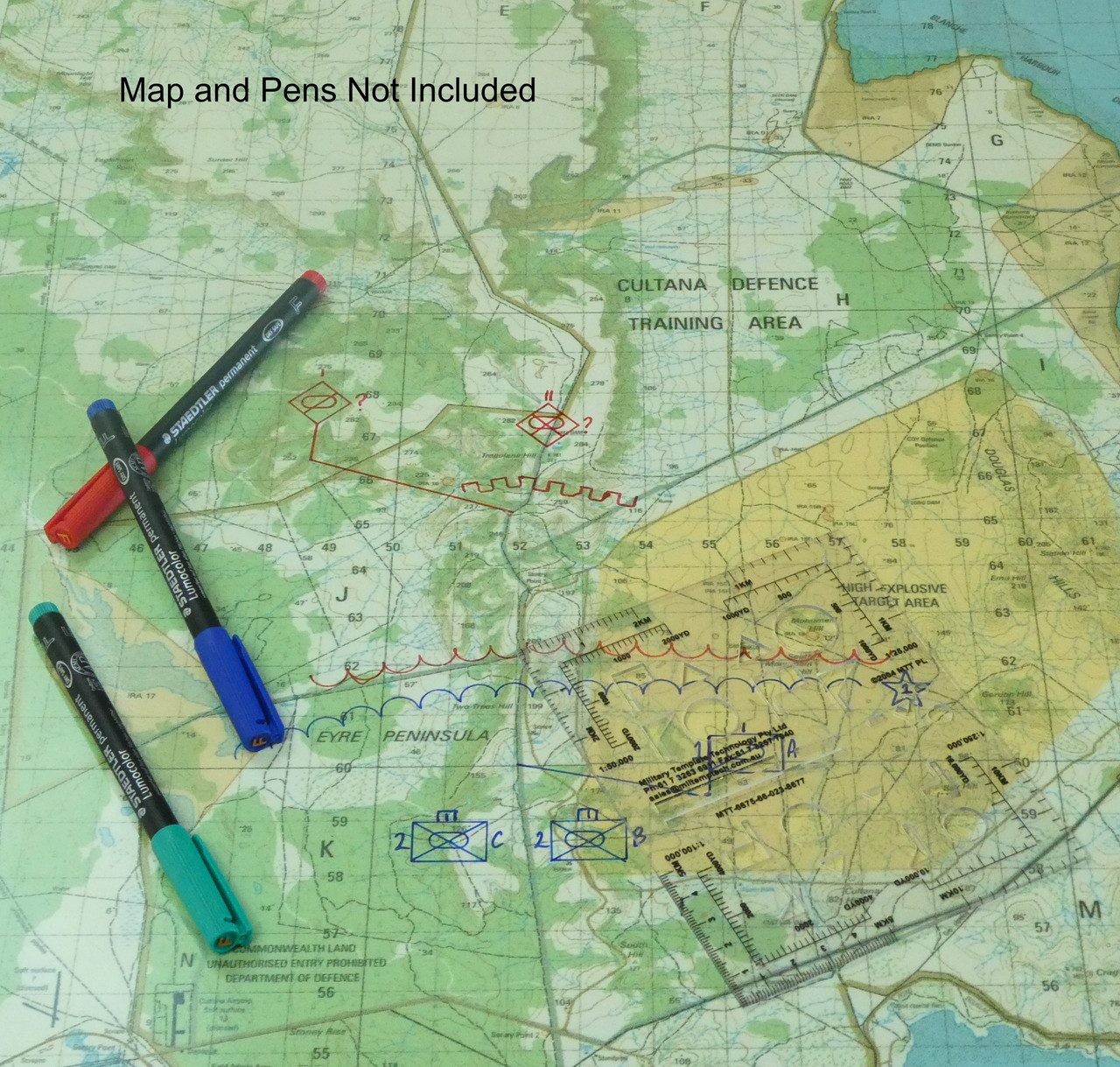 NSN 6675-66-023-8677 stencil in use on a military map